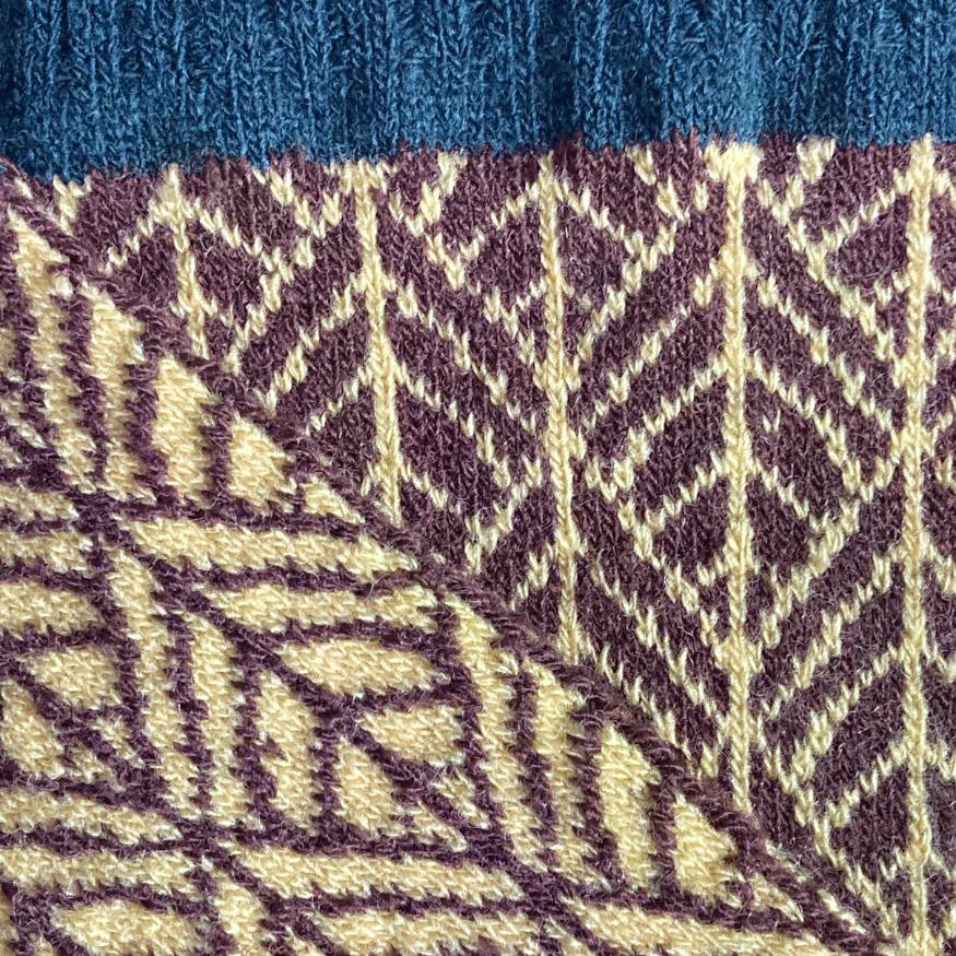 Knitido Gemini Gemusterte Kuschelsocken aus Merinowolle grün/gold